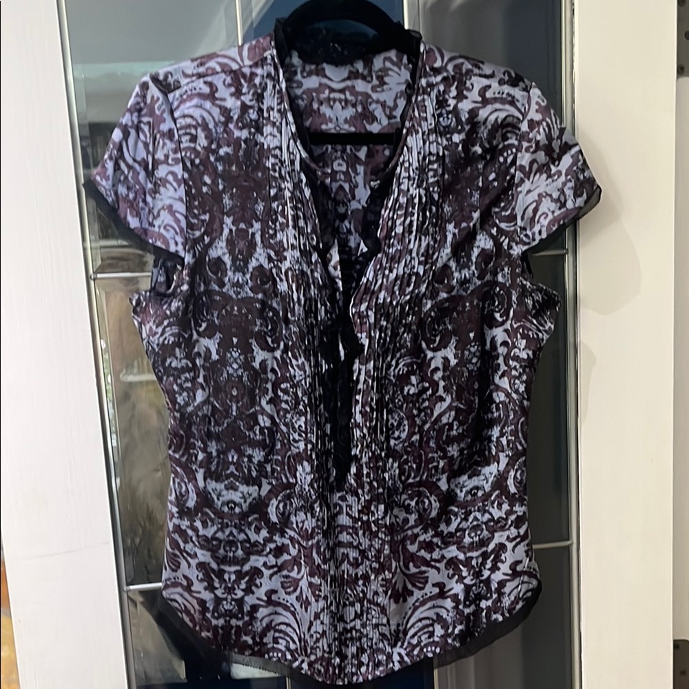 Elie Tahari Silk  Patterned Blouse with black trim, side zip